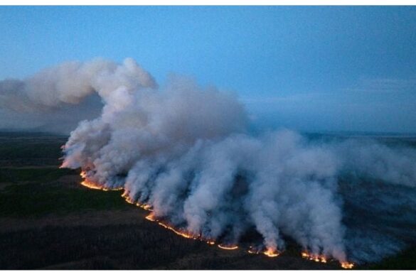 Fumo dall’altra parte del mondo: le Alpi oscurate dagli incendi in Canada