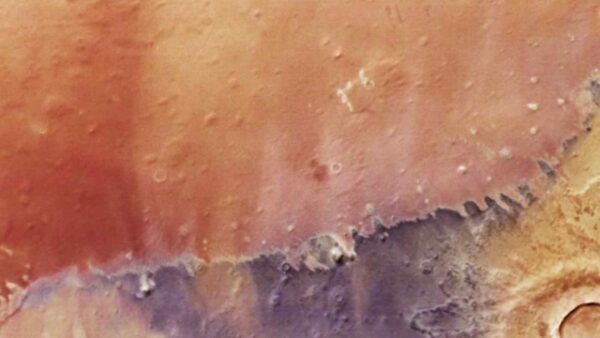 Una foto ESA di Marte rivela paesaggi pittorici e possibili riserve d'acqua, cruciali per futuri insediamenti umani.