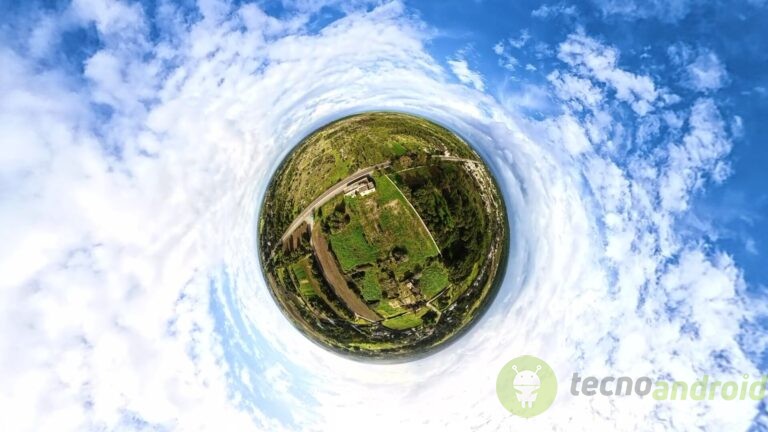 Titolo: Paesaggio Sferico. Alt text: Immagine a 360° di un paesaggio naturale con campi, alberi e cielo sereno, creando un effetto sferico per esplorare il panorama in modo immersivo.