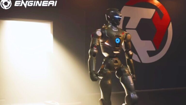 Robot futuristico umanoide nero e argento con luci blu, in piedi in un ambiente moderno con logo tecnico sullo sfondo, rappresenta innovazione e progresso nel campo della robotica.