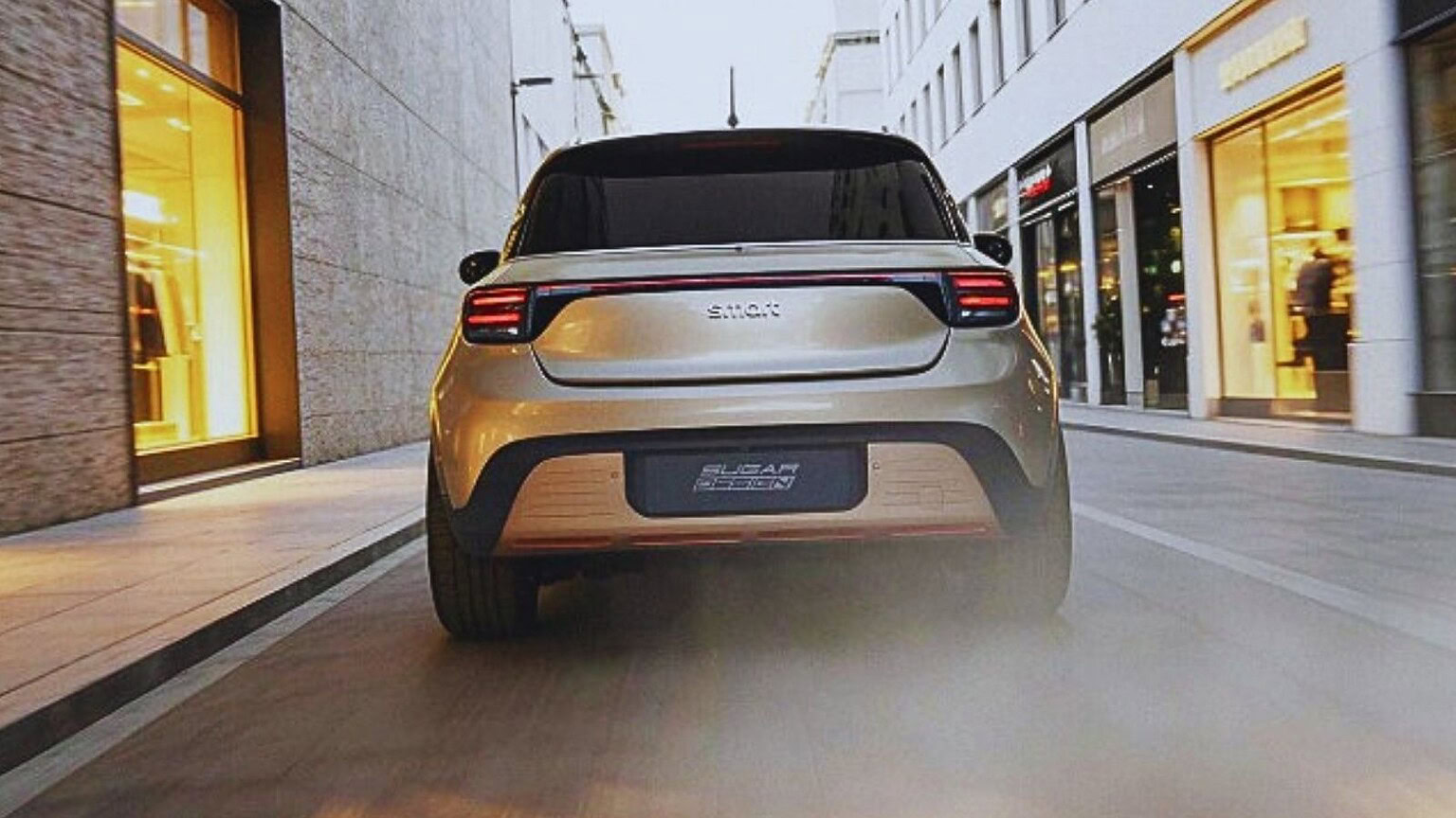 Auto elettrica compatta moderna in città con design innovativo e tecnologia avanzata, ideale per la mobilità sostenibile e il comfort di guida urbano.