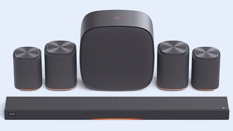 Sistema home theater con soundbar e altoparlanti surround, dispositivo audio di alta qualità ideale per un’esperienza sonora immersiva.
