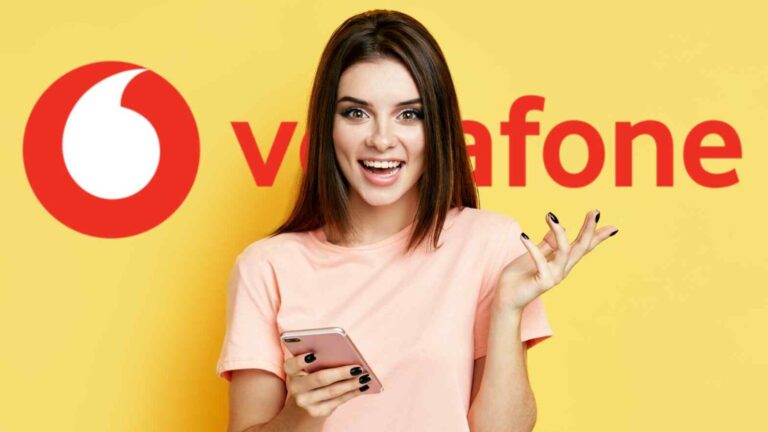 Ragazza felice con smartphone Vodafone, pubblicità telecom e offerte mobile.