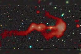 RAD-BAARG, la galassia a forma di arco scoperta dai volontari