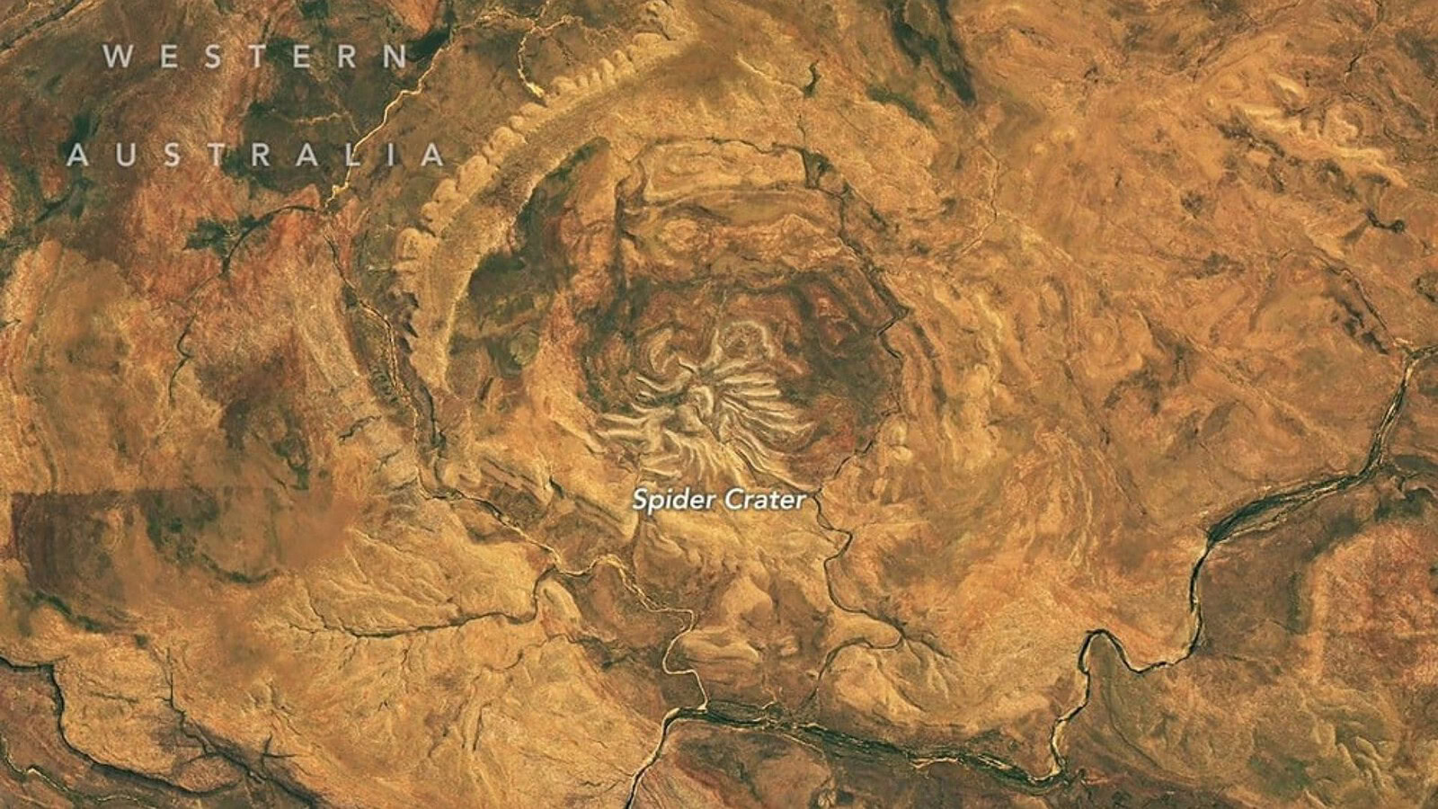 Spider Crater, il cratere a forma di ragno visto da Landsat 9